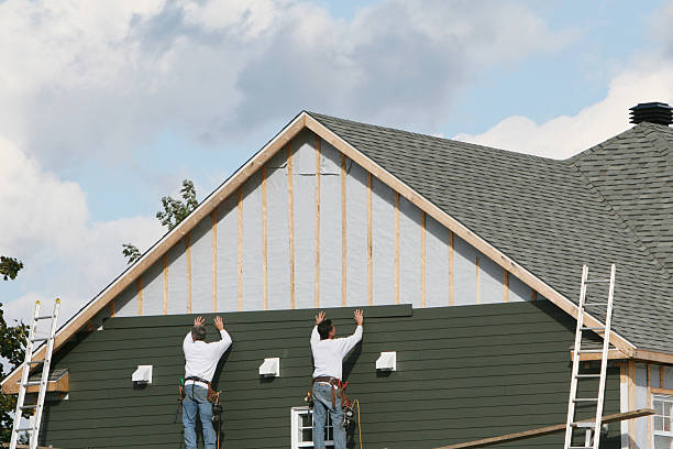 Professional Siding Replacement technician working in Quincy, MA